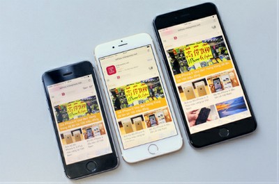 iPhone 6 (giữa) màn hình 4,7 inch có kích thước hợp lý hơn so với 6 Plus bên phải.